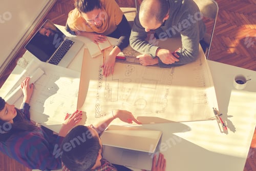Preview: Young Group Of People/Architects Discussing Business Plans.