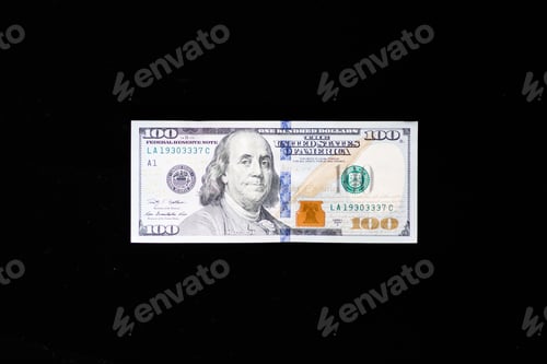 Preview: One hundred dollars bill cash banknote isolated on black background