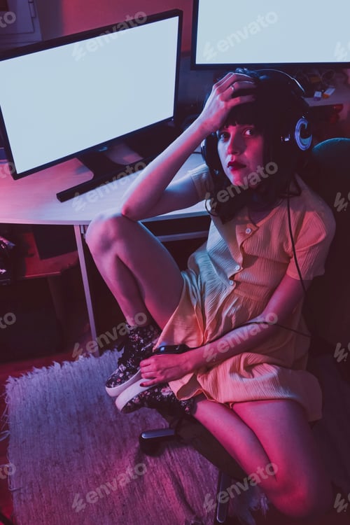 Preview: Young streamer woman working at night from home