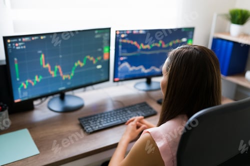 Preview: Businesswoman looking at the stock market
