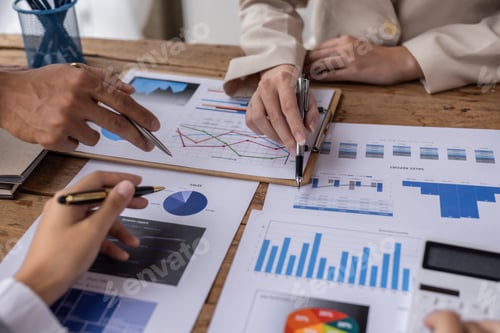 Preview: Business people advisors talk, planning analyze investment and marketing on a tablet in the office.