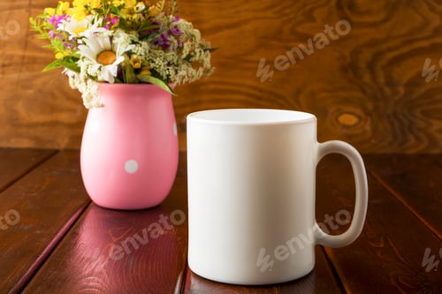 Preview: Placeit-White coffee mug mockup with field flowers