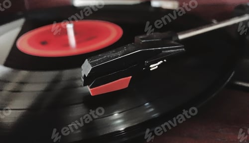 Preview: Listening to music from an album spinning on a record player