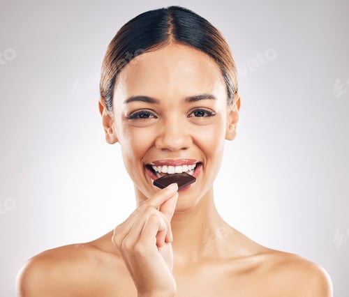 Preview: Woman, eating chocolate and portrait for skincare, beauty and wellness, health or diet on white bac
