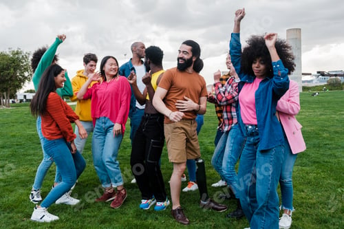 Preview: Group of young people from different cultures dancing and enjoying free time outdoors