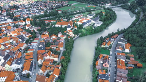 Preview: Aerial view of Fussen cityscape surrounded by buildings