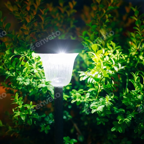 Preview: Small Solar Garden Light, Lantern In Flower Bed. Garden Design.