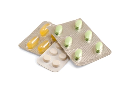 Preview: Pills in Blister Packs on White Background