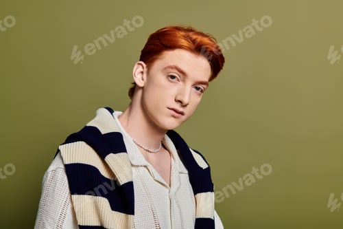 Preview: Capturing the emotional essence of a young man with striking features and a unique style