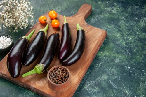 Preview: front view black eggplants on cutting board dark background food color ripe vegetable dinner meal
