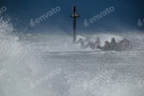 Preview: Heavy storm at the gates to the port of Klaipeda, Lithuania. Baltic Sea against a gray cloudy sky