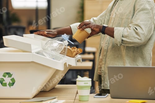Preview: African-American Man Recycling Paper Cup