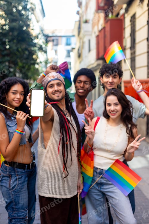Preview: Happy activists showing smartphone with blank screen at lgbt parade