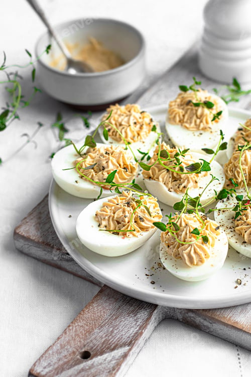Preview: Deviled eggs on a white plate