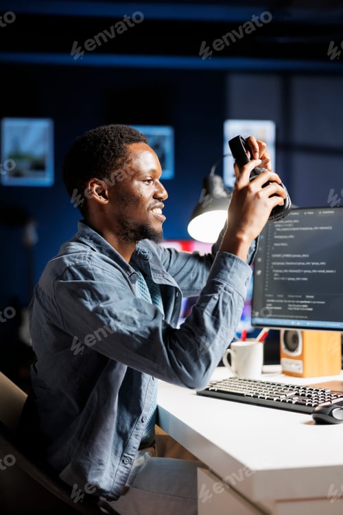 Preview: Computer expert encodes html scripts while enjoying music