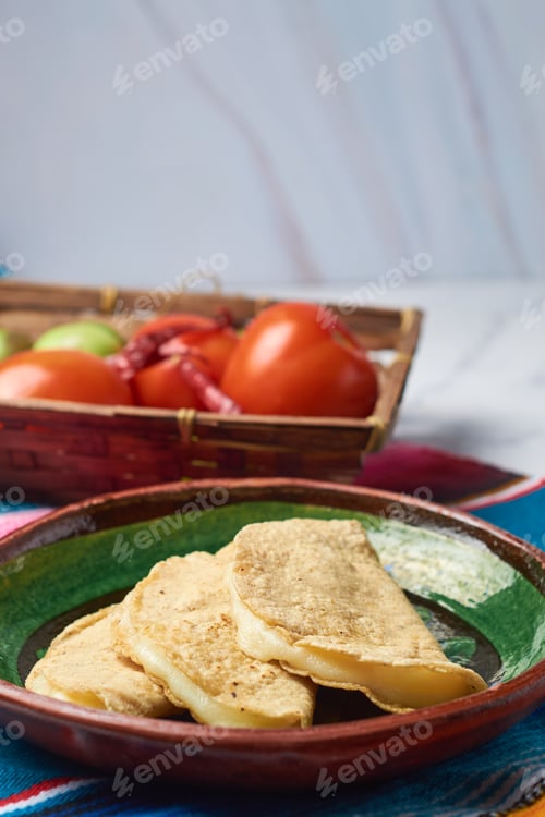 Preview: Authentic Mexican quesadillas made with corn tortillas filled with cheese.