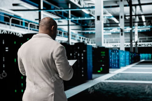 Preview: Technician in data center workspace running diagnostic tests, increasing uptime