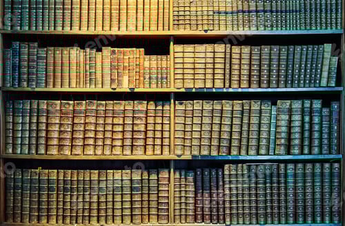 Preview: Antique Books Filling Shelves in an Old Library
