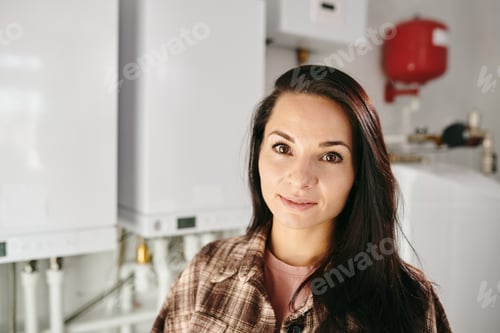 Preview: Young Caucasian brunette female looking at camera