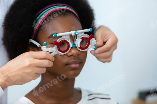 Preview: young woman african american wear trial frame eye test ophthalmological in optics clinic.