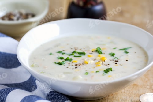 Preview: Delicious Creamy Corn Chowder Soup in a White Bowl