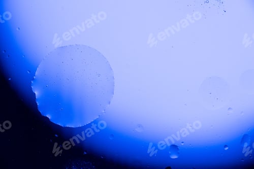 Preview: Macro of oil drops on the water abstract macro background