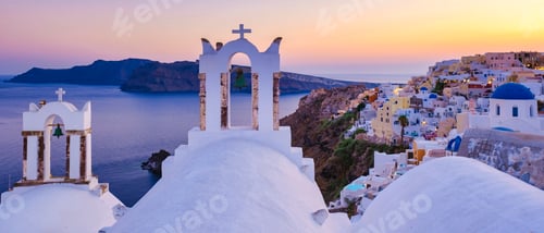 Preview: White churches an blue domes by the ocean of Oia Santorini Greece, traditional Greek village