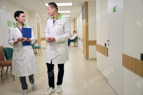 Preview: Employees of the medical center are walking along the corridor