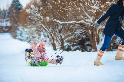 Preview: Family of dad and kids vacation on Christmas eve outdoors