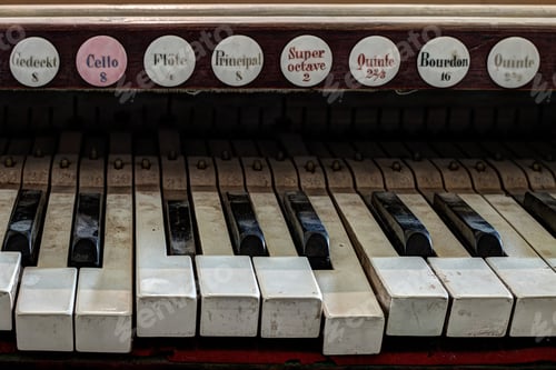 Preview: Detail of old, broken and dusty organ keys