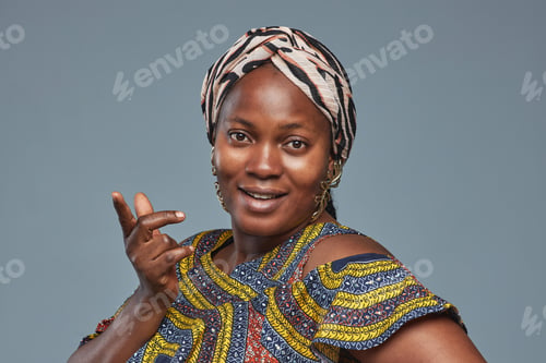 Preview: African young woman in headscarf