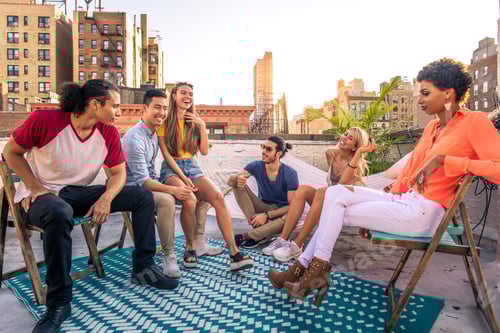 Preview: Group of friends having party on a rooftop