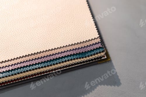 Preview: Catalog of multi-colored fabric samples. Textile industry background. Colored cotton fabric. Palet