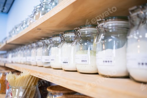 Preview: Glass jars containing food staples in sustainable plastic-free grocery store