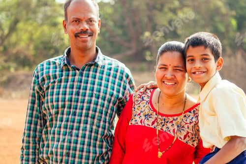 Preview: indian happy family in summer park at picnic singing a song