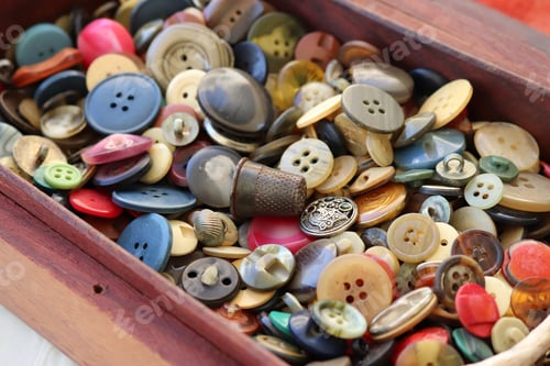 Preview: many old buttons are in a box