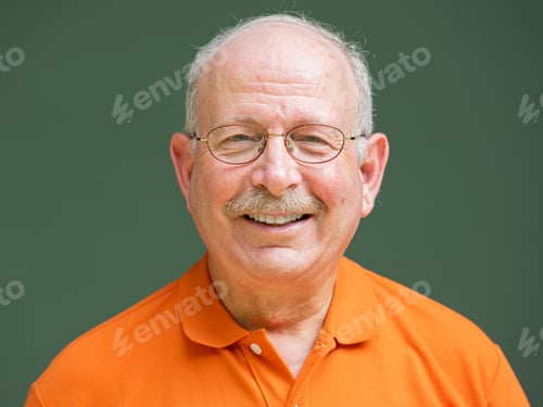 Preview: Happy grey haired senior man with mustache wearing eyeglasses