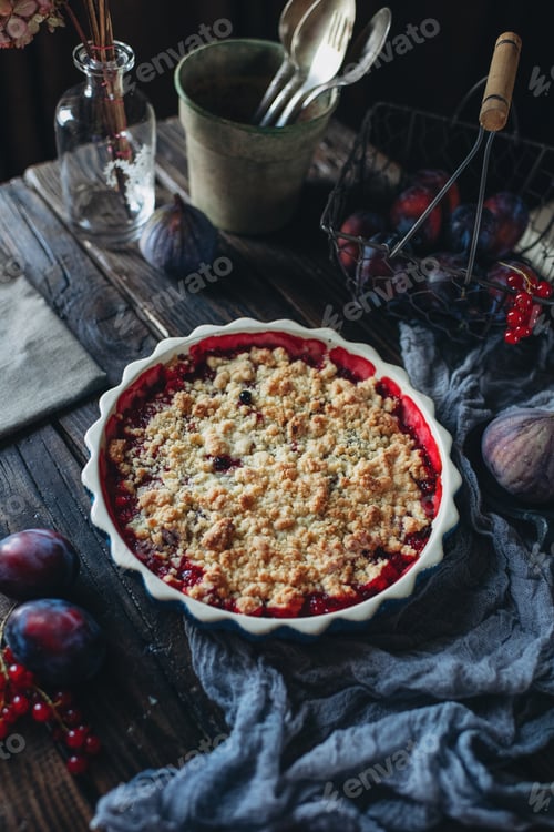 Preview: Homemade cakes, sweet plum cake on a dark background, rustic table setting
