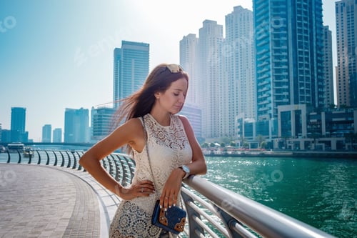 Preview: Dubai travel tourist woman on vacation walking
