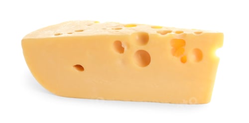 Vista previa: Piece of delicious cheese on white background