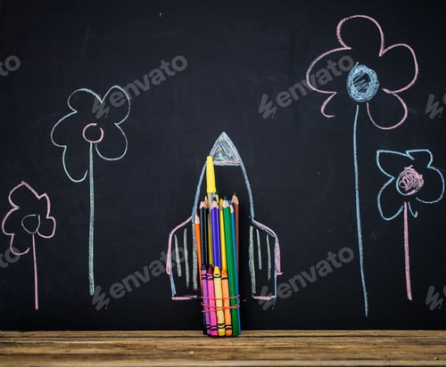 Preview: Back to school black background the missile made with pencils, drawing crayons books