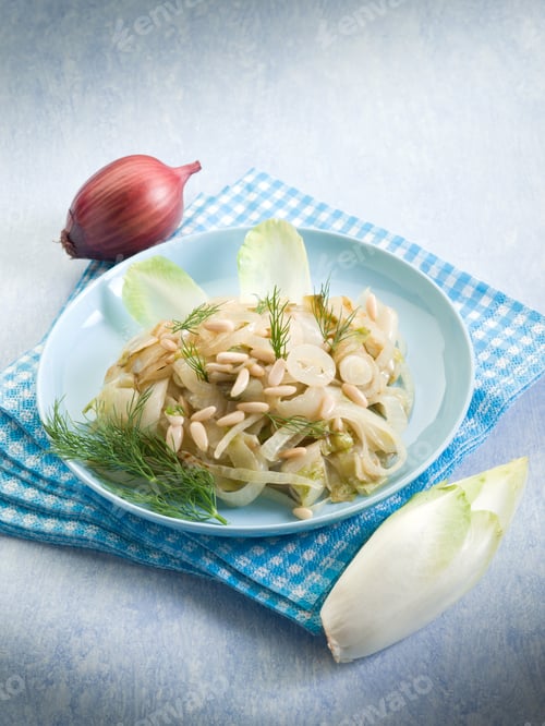 Preview: salad with sauteed endive onions and pine nuts