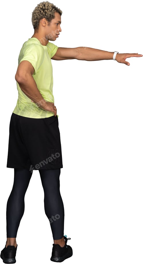Preview: a man in a yellow shirt and black tights is standing with his arms out