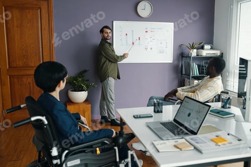 Preview: Business People Having Meeting In Office