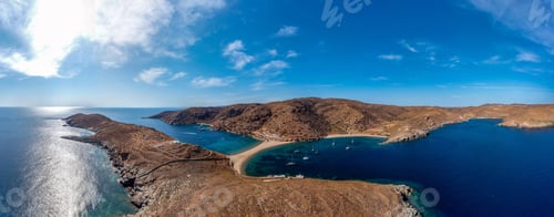 Preview: Kolona Fykiada double sided sandy beach, panoramic drone view. Greece, Kithnos island, Cyclades.