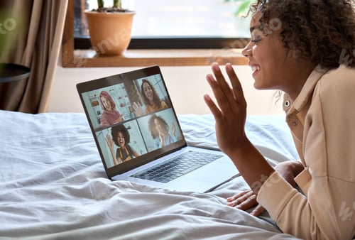 Preview: African American female student having video call videoconference on laptop.