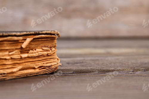 Preview: Worn ancient book close-up.