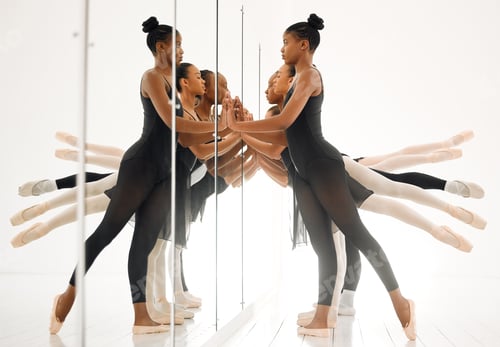 Preview: Just get up and dance. Shot of a group of ballet dancers practicing a routine in a dance studio.