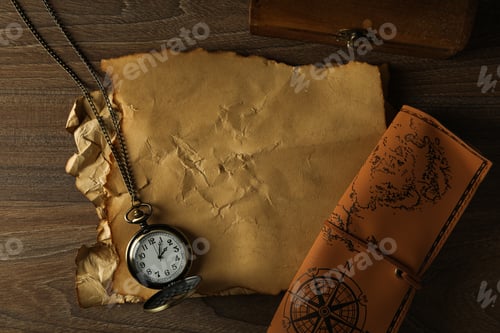 Preview: Columbus Day. Vintage pocket watch with an old sheet of paper