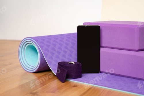 Preview: Yoga Accessories on Wooden Floor with Phone